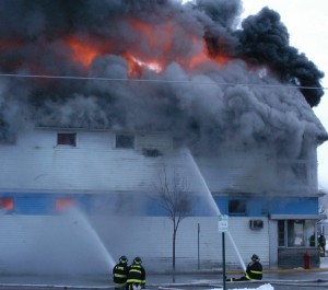 The 125 year-old buildings went quickly as the fire spread from the front to the rear. (Photos by Richard Lamb)