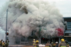 Less than one hour after arriving, firefighters faced this scene on Feb. 12, 2006 as the Advance and Big D's Pizza burned. 