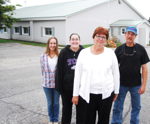 Staff at the Presque Isle Count Council on Aging in Onaway includes (from left) Allison Frost, Jera Wreggeslworth, Sue Flewelling and Gene Debeust. (Photo by Peter Jakey)