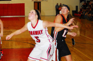 Taylor Ehrke boxes out Ally Streich as the girls' basketball season got underway. (Photo by Peter Jakey)