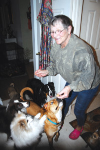 SNACK TIME at the Joan Moran home can get a little crazy. The Tower woman has had rescue dogs and animals almost all of her life. (Photo by Peter Jakey) 