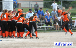 All-state catcher Sarah Meredith brought the Hurons to within one run at 8-7 with her home run in Tuesday's quarterfinal game in Traverse City. (Photo by Richard Lamb)