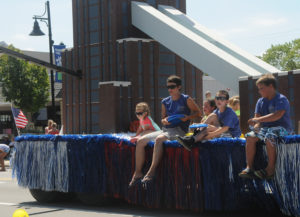 Sunday's grand parade draws interesting parade entries and large crowds to line Third Street. (Photo by Richard Lamb)