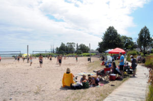 The beach is a great setting for volleyball action. (Photo by Richard Lamb)