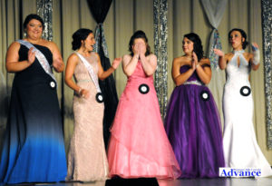 Tania Styma (center) can't believe what master of ceremonies Randy Idalski just said, that she is the new Miss Posen. Contestants (from left) are Kelsey Jakubcin, Lindsey Randall, Styma, Jade Adybel and Elizabeth Kowalski. (Photo by Richard Lamb)