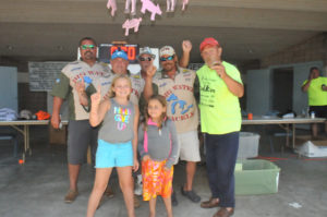 LOONEY BIN won the 2016 Fat Hogs Fishing Frenzy weighing six fish in two days totaling 106.57 pounds. Front from left are Aspen and Abby Wortley. Back from left are Todd Wortley, Ty Wortley, Terry Kowalski, Troy Wortley and Terry Wortley. (Photo by Angie Asam)
