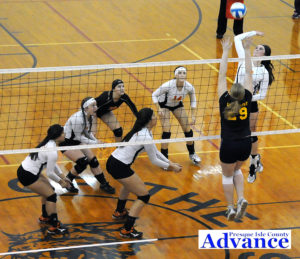 WITH ALL eyes on her, senior left hitter Hannah Dittmar lines up a kill. Pictured are (from left) Erika Peacock, Mary Brege, Jayna Hance, Taylor Fleming and Kayla Rabeau. (Photo by Richard Lamb)