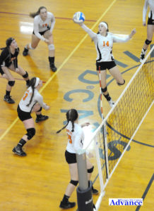 High-flying Kayla Rabeau goes for a shot in the district semifinal match with Onaway. (Photo by Richard Lamb)