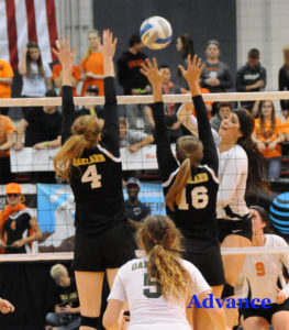 Taylor Fleming slams home one of her eight kills in the match. (Photos by Richard Lamb)