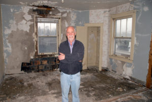 TO SAY there is a lot of work to be done at the former Brooks Hotel is an understatement. Owner Scott McLennan, who stands in a back room of the second floor, that once was used as a hotel room, has not immediate plans for the upstairs, but plenty for the first floor.(Photo by Peter Jakey)