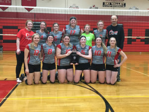 DEFEATING TWO ranked opponents in a row the Onaway Cardinals won their home tournament Saturday. Front from left are Daria Domke, Kaitlyn Boettger, Maddie McLean, Jaclyn Nash, Kayanna Dean and Michelle Anderson. Back from left are assistant coach Megan Estep, Calley Selke, Malaurie McLean, Sunny Flory, Jordan Larson, Kennedy Crawford and head coach Steve Watson. (Photo by Angie Asam)