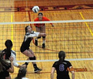 Kristin Brege makes an assist on a Huron attack. 