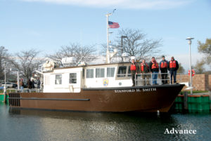 THE STANFORD H. Smith should be well on its way to its homeport Kewaunee, Wisconsin. Tours for the media were provided Tuesday in Rogers City by, from left, Mark Holey, Mike Mroz, Jason Willis, Gregory Schultz and Scott Speed. (Photo by Peter Jakey)