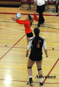 Junior libero Jayna Hance makes one of her 13 digs in the championship match.