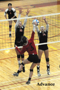 Maddie Hincka and Kayla Rabeau team up to block a Bellaire shot. 