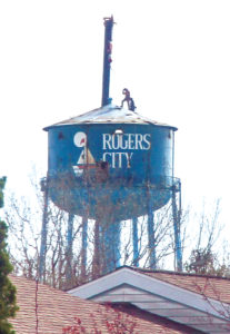 IT TOOK workers less than a day to raze the Rogers City water tower and remove a landmark from the city. (Photo by Jennifer Adkins)