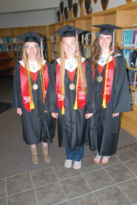 LEADING ONAWAY High School’s 2018 graduation ceremony will be, from left, honor student Sabrina Goddard, valedictorian Carmen Sellke and salutatorian Kaitlyn Boettger. The program starts at 2 p.m. Sunday in the high school gym. (Photo by Peter Jakey) 