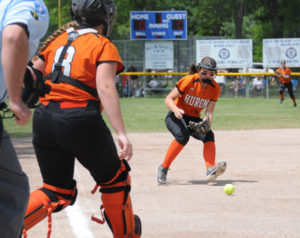 Hannah Fleming fields a bunt and will throw out the batter on this play. 