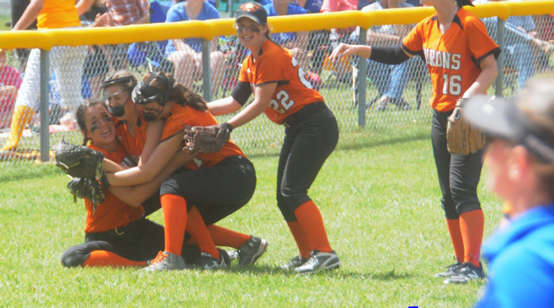 Kayla Rabeau is tackled after making a spectacular catch to end the regional championship game.
