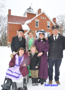 MEET THE Kleins! It’s a family of lighthouse caretakers that received the okay to move into the living quarters of 40-Mile Point Lighthouse. Pictured are, front from left, Sabre, Anthony, back, Evan, Cora, Lisa and Eric. (Photo by Peter Jakey) 