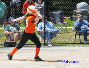 Sophomore center fielder Karissa Rabeau follows the flight of the ball as her double knocked in two runs in the quarterfinal win over Rudyard. (Photo by Richard Lamb)