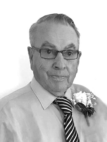 0321-obit-Rickle-D-Photo-Blue-Shirt