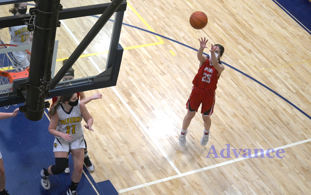 Posen's Elizabeth Romel launches a shot in Wednesday's win over Wolverine. She led the team with 14 points. 