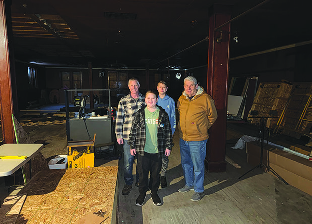 WITH THE purchase of the former Cash’s Lakeside Inn by the Rogers City Community Theatre, volunteers are needed to help with the renovation. Pictured are (from left) RCCT board president Jeff Janowic his sons Walter and Daniel and volunteer John Krajenta. (Photo by Richard Lamb)